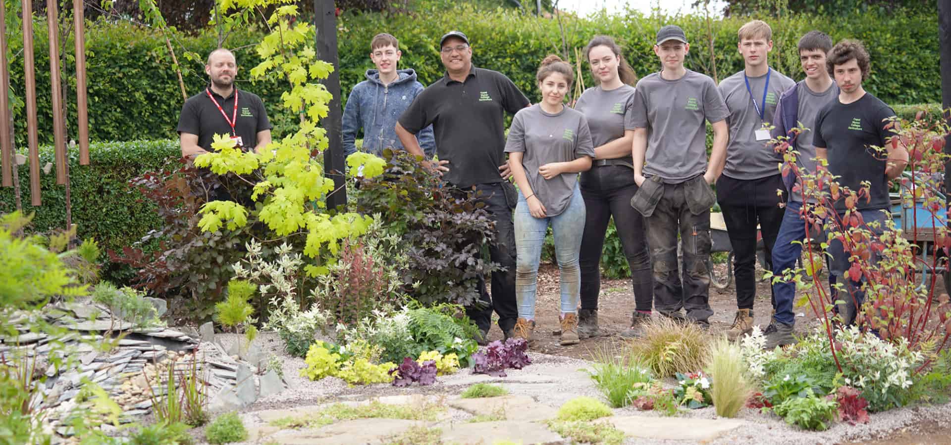Students with a garden they have created at Capel Manor College