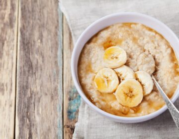 Bowl of porridge with banana and honey