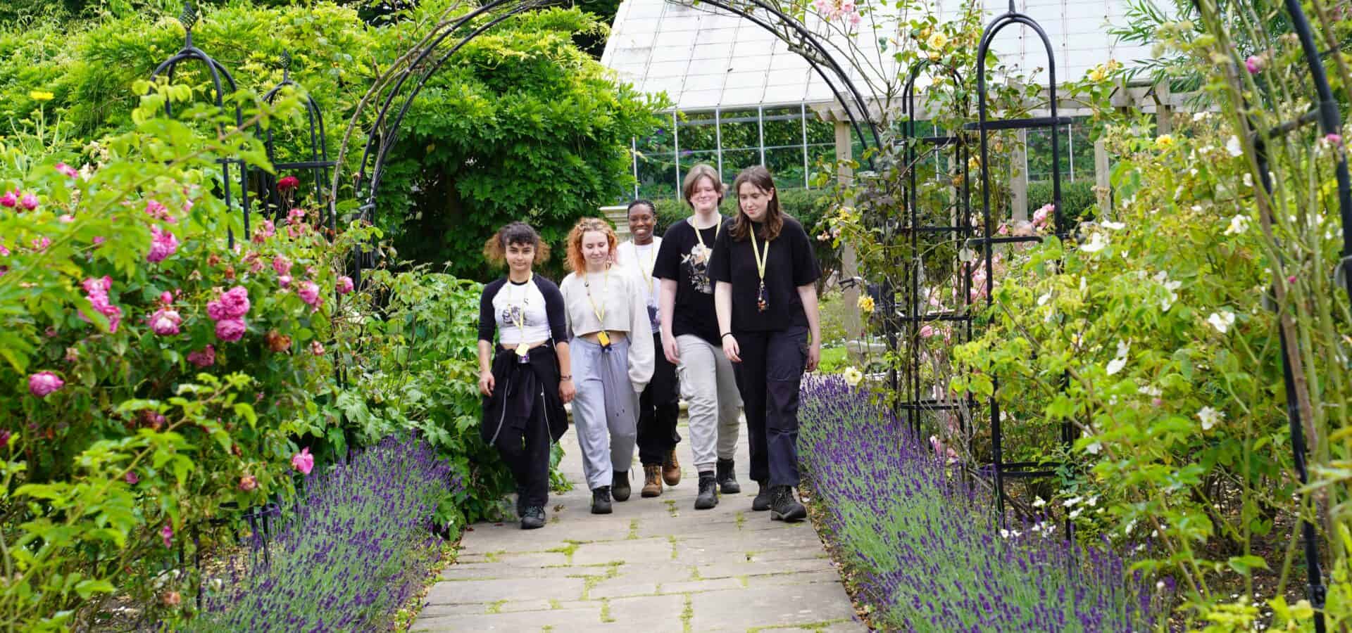 Students walk down a beautiful path at Capel Manor College