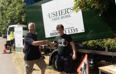 Capel Manor College apprentice shaking hands with a member of staff from new employer - Usher's Tree Work.