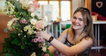 Floristry Student Working on a Bouquet of Flowers