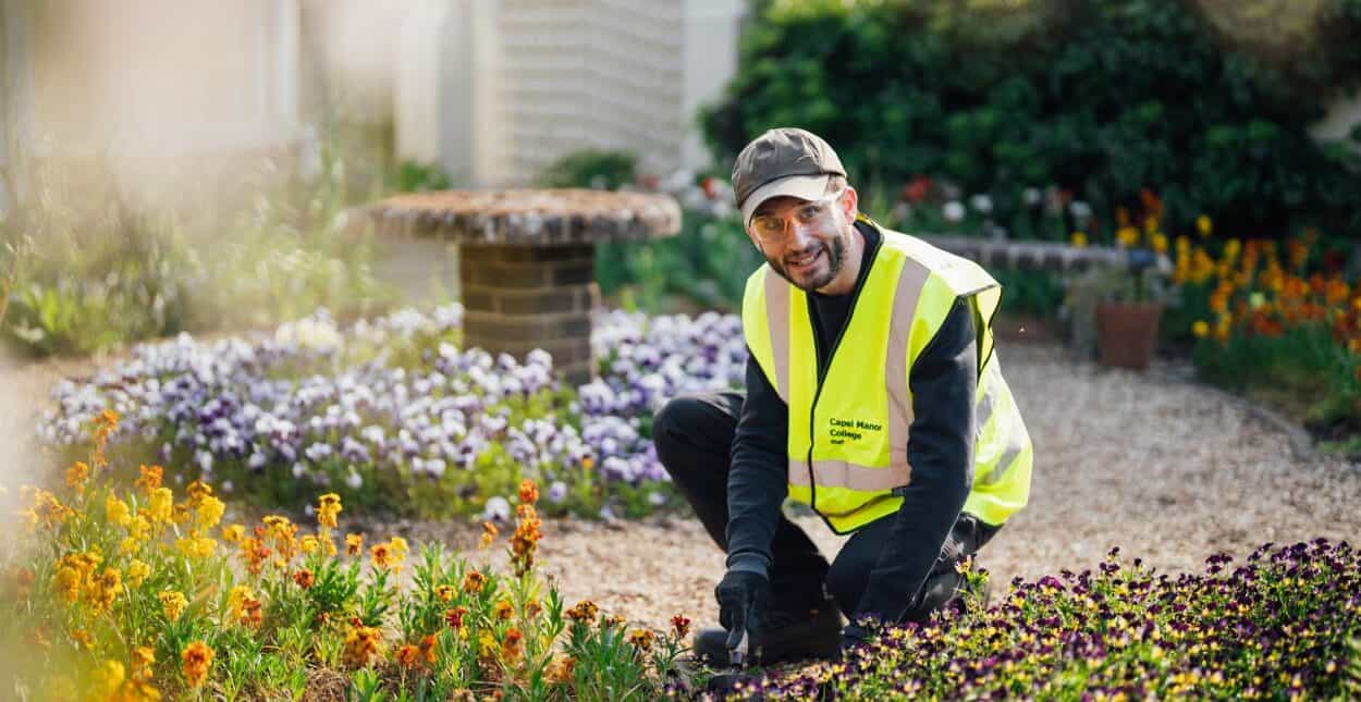 Man planting flowers