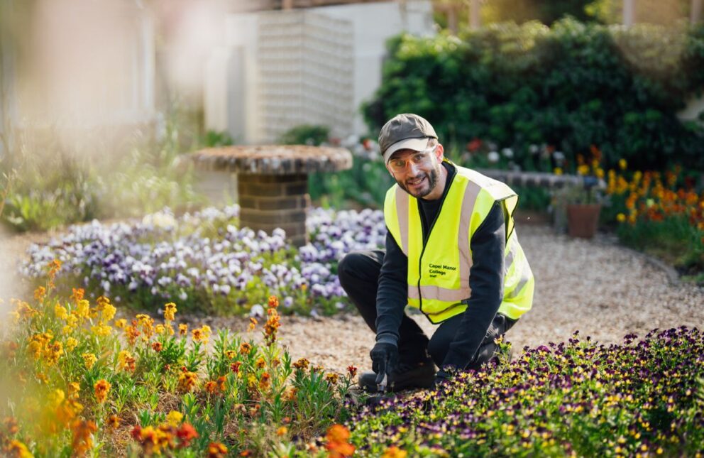 Man planting flowers