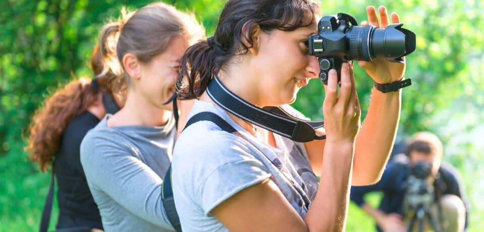 Photography students taking photos during class