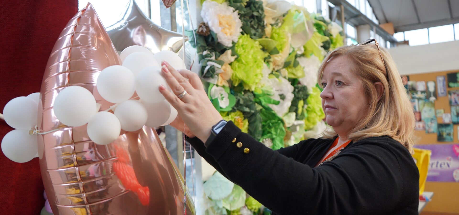 Balloon artistry student at Capel Manor College creating a display.