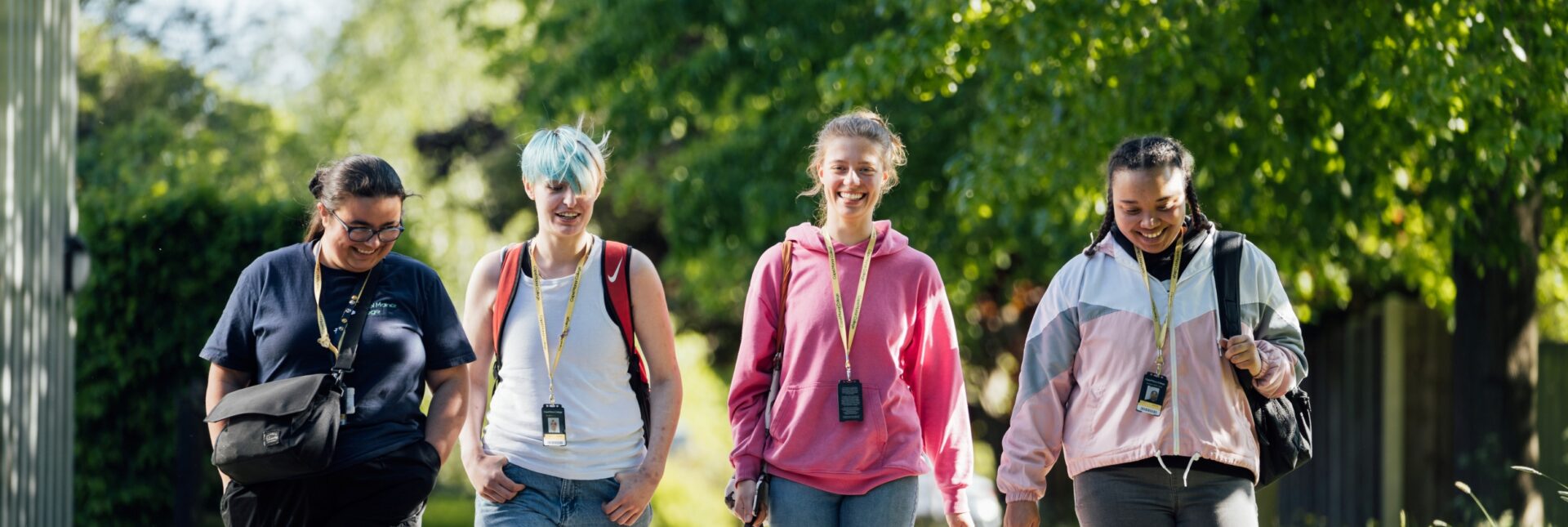 A group of students walking in the grounds of Capel Manor College's Enfield Campus.