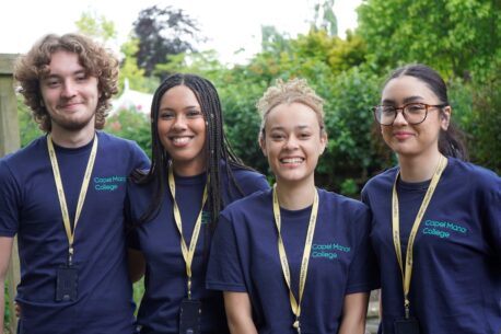 A group of students at Capel Manor College, smiling for a photo.