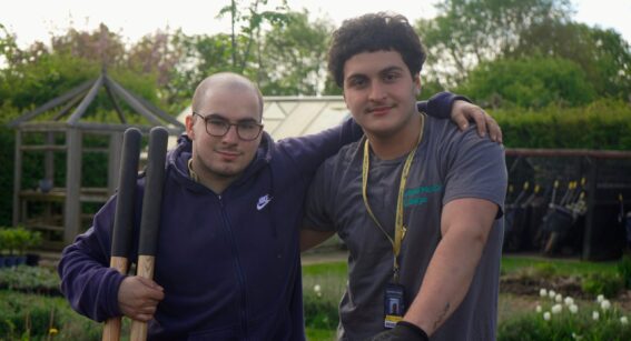 Two horticulture students at Capel Manor College during a practical session out in the gardens.