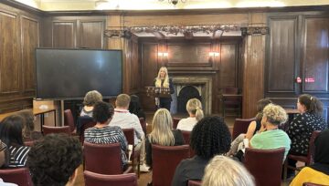 Heather Marks talks to colleagues