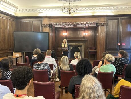 Heather Marks talks to colleagues